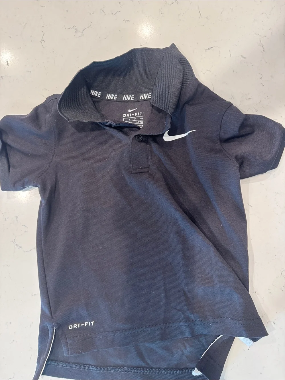 Nike Navy Blue Kids Polo Shirt with White Swoosh